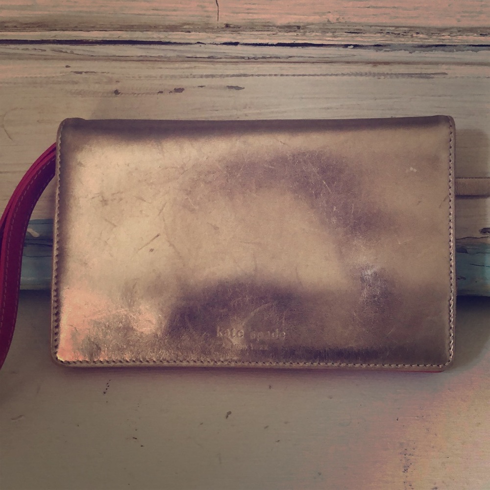 Kate Spade metallic gold wristlet wallet